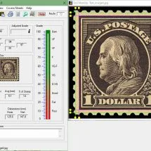 Screenshot of EzGrader stamp grading software measuring stamp centering, with grade panels beside a scanned US $1 stamp
