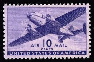 Copy #1 — US 10 cents Air Mail stamp, Sc# C27, transport plane design with all four margins visible for judging centering