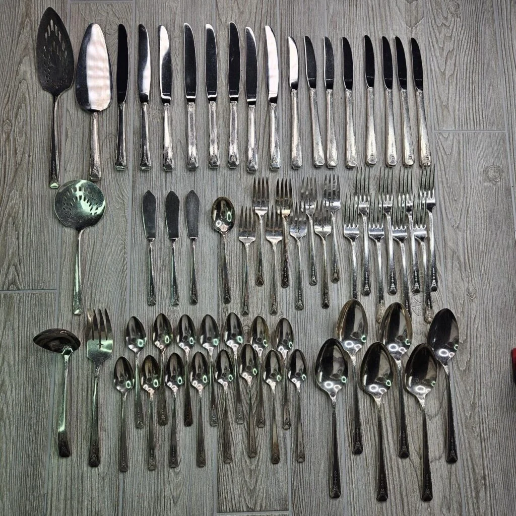 collection of Oneida Milady serving utensils and spoons