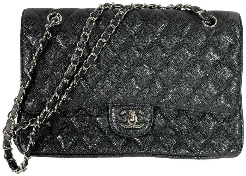 Vintage Chanel “Jumbo Double Flap” black caviar bag
