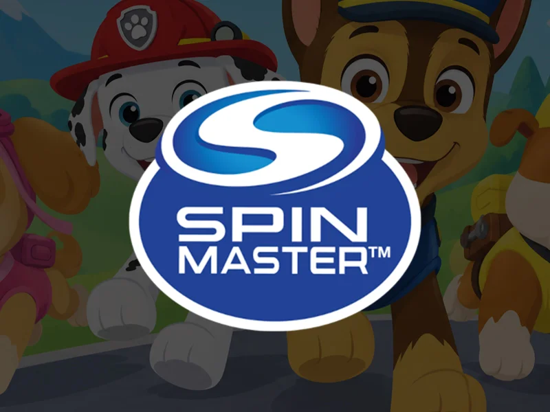 Logo of Spin Master with cartoon characters from a children's animated series in the background.