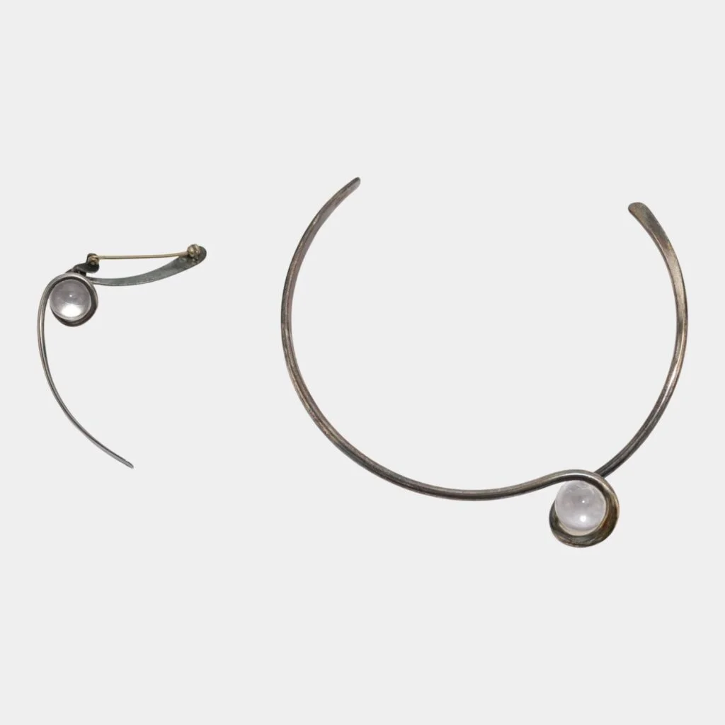 Art Smith’s “Lady Day” brooch and “Simplicity” necklace designs 